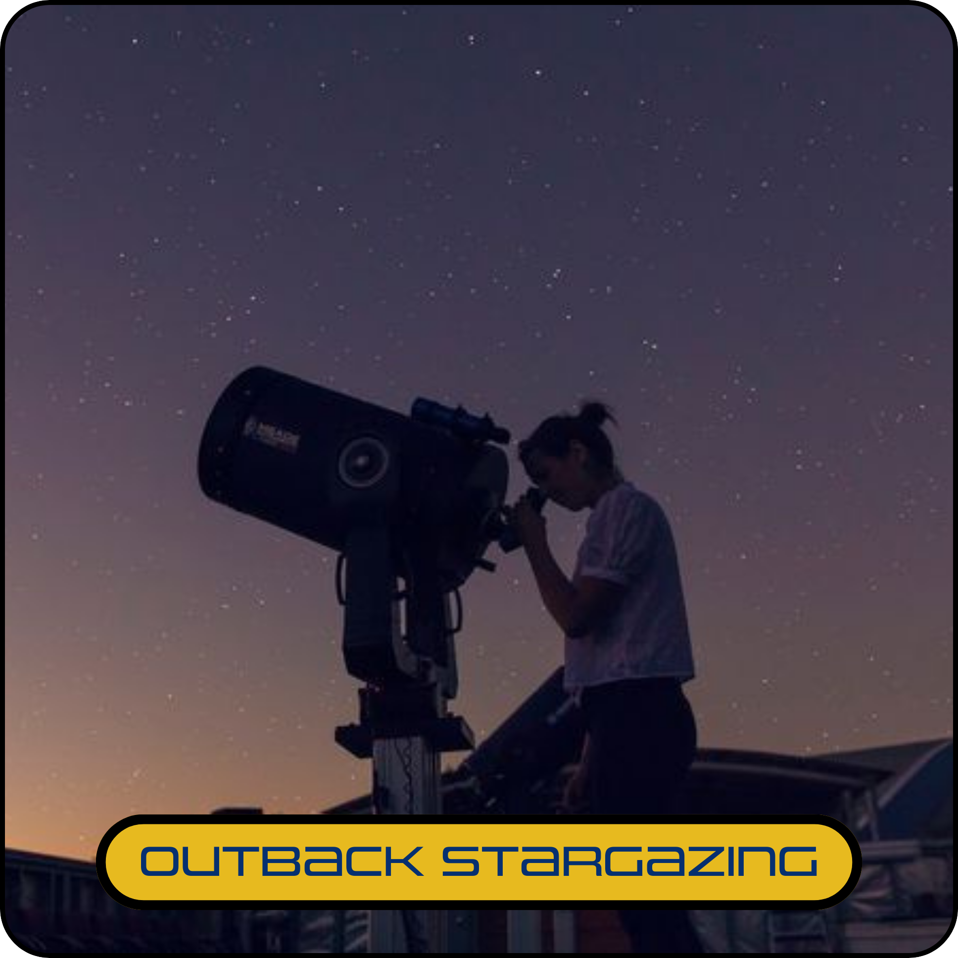 Person looking through telescope at twilight.